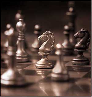 Chess set pieces in sepia